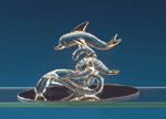 Glass Sculpture Dolphins On Waves